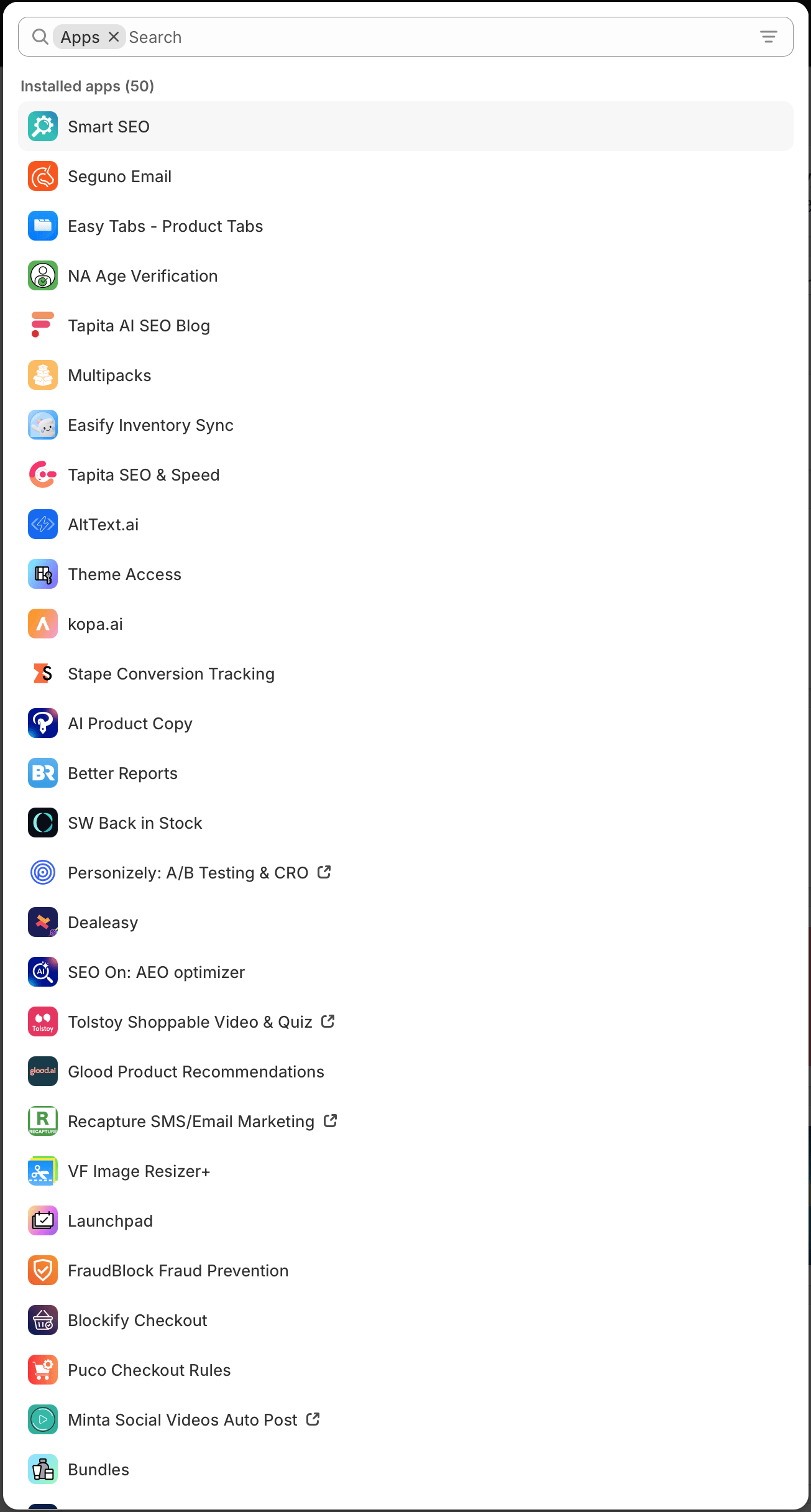 Shopify admin showing 10+ installed apps replacing features a premium theme would include natively.